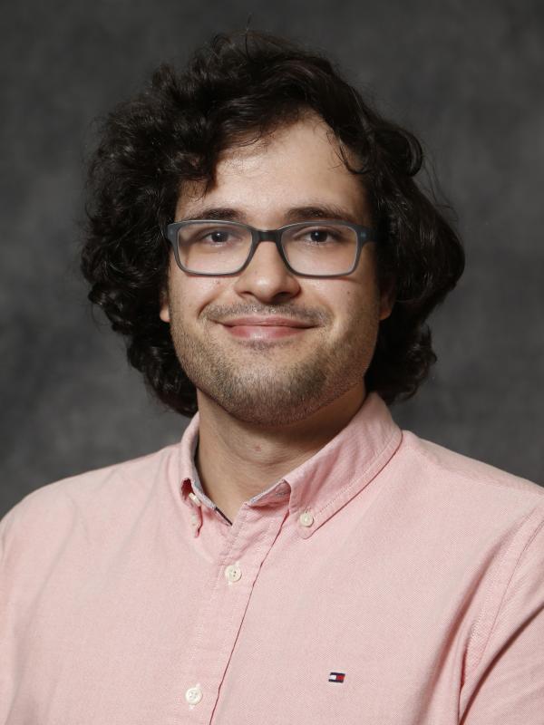 Headshot of Konur Oyman