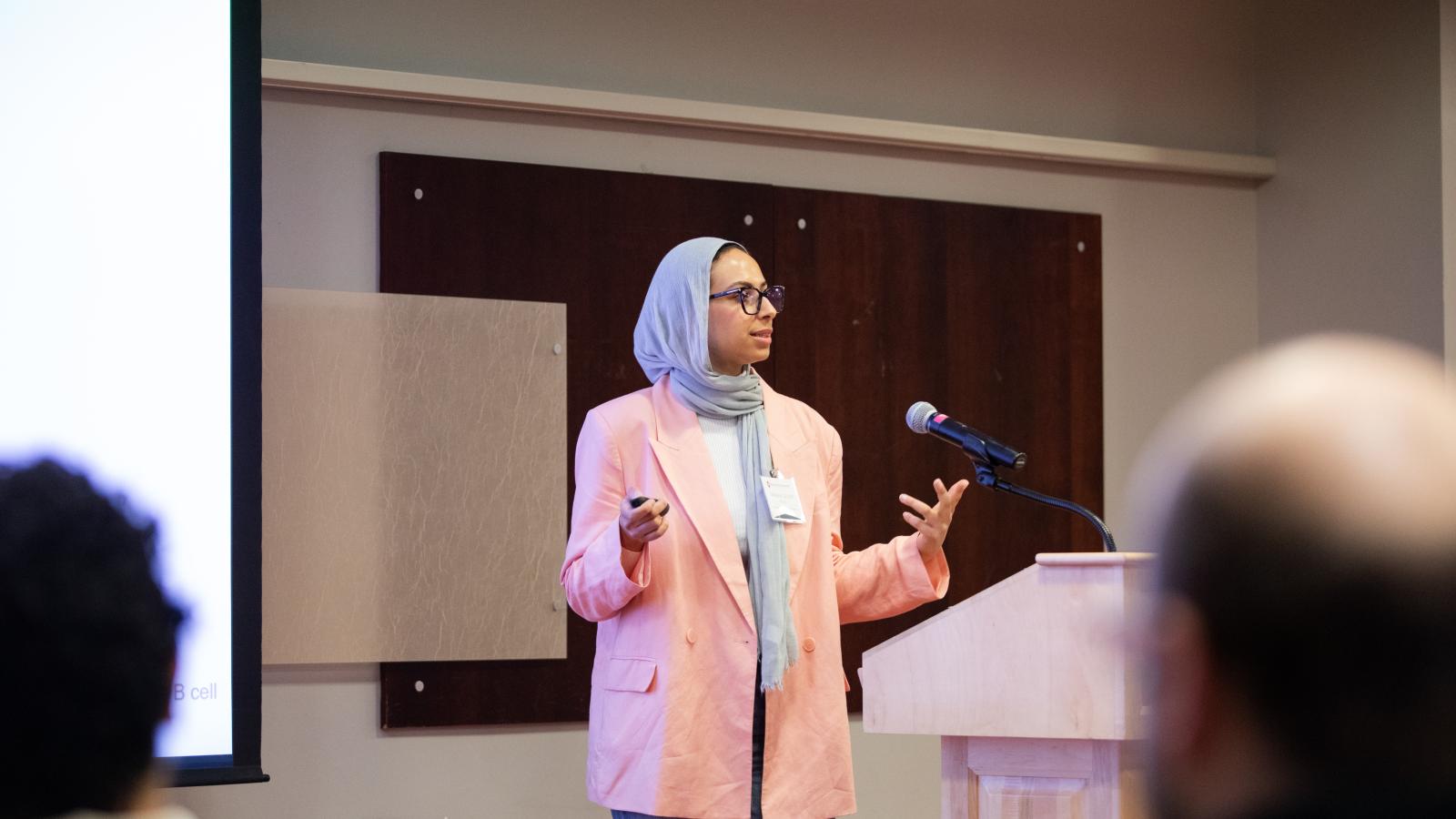 MCDB student presenting their research